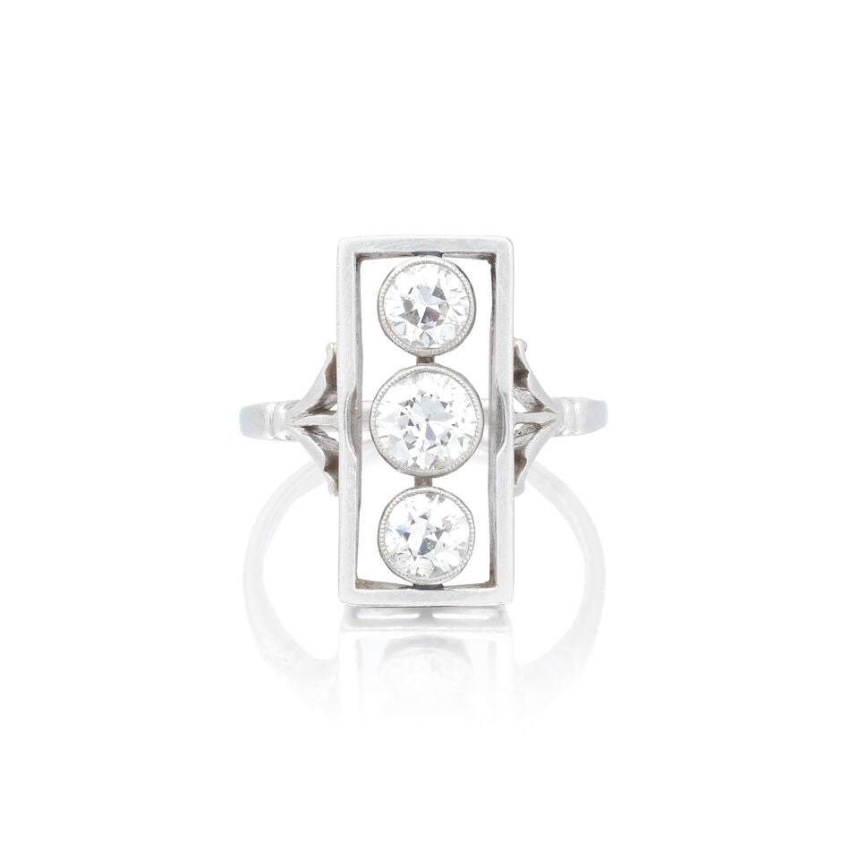 DIAMOND THREE-STONE PANEL RING: DIAMOND THREE-STONE PANEL RING Old brilliant-cut diamonds approx. 1.10cts total Ring size approx. O½ Weight approx. 6.0g Footnotes: OVERALL CONDITION some surface wear commensurate with use to