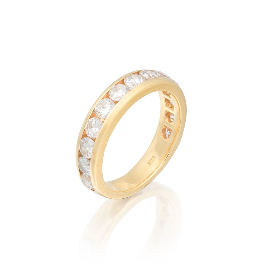 DIAMOND-SET HALF ETERNITY RING: DIAMOND-SET HALF ETERNITY RING Brilliant-cut diamonds approx. 1.95cts total Ring size approx. O Weight approx. 5.0g Footnotes: OVERALL CONDITION Light surface wear to unhallmarked yellow metal
