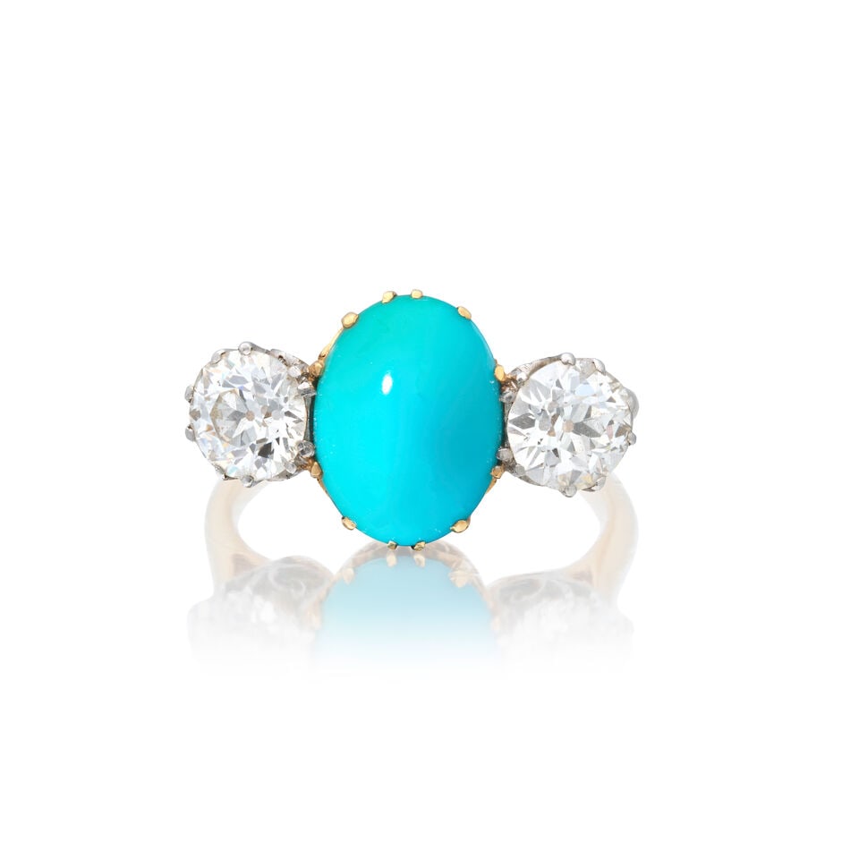 TURQUOISE AND DIAMOND THREESTONE RING, CIRCA 1890: TURQUOISE AND DIAMOND THREESTONE RING, CIRCA 1890 Turquoise cabochon Old brilliant-cut diamonds approx. 1.20cts total Ring size approx. G½ (hoop off round) Weight approx. 3.5g Footnotes: OVERALL 