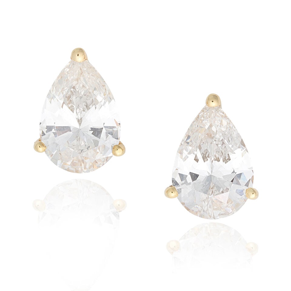 DIAMOND EARSTUDS, CIRCA 1980: DIAMOND EARSTUDS, CIRCA 1980 Pear-cut diamonds weighing 0.97 carat and 1.04 carats French assay marks Width 9.2mm Weight approx. 2.5g Footnotes: OVERALL CONDITION Light surface wear to unhallmarked