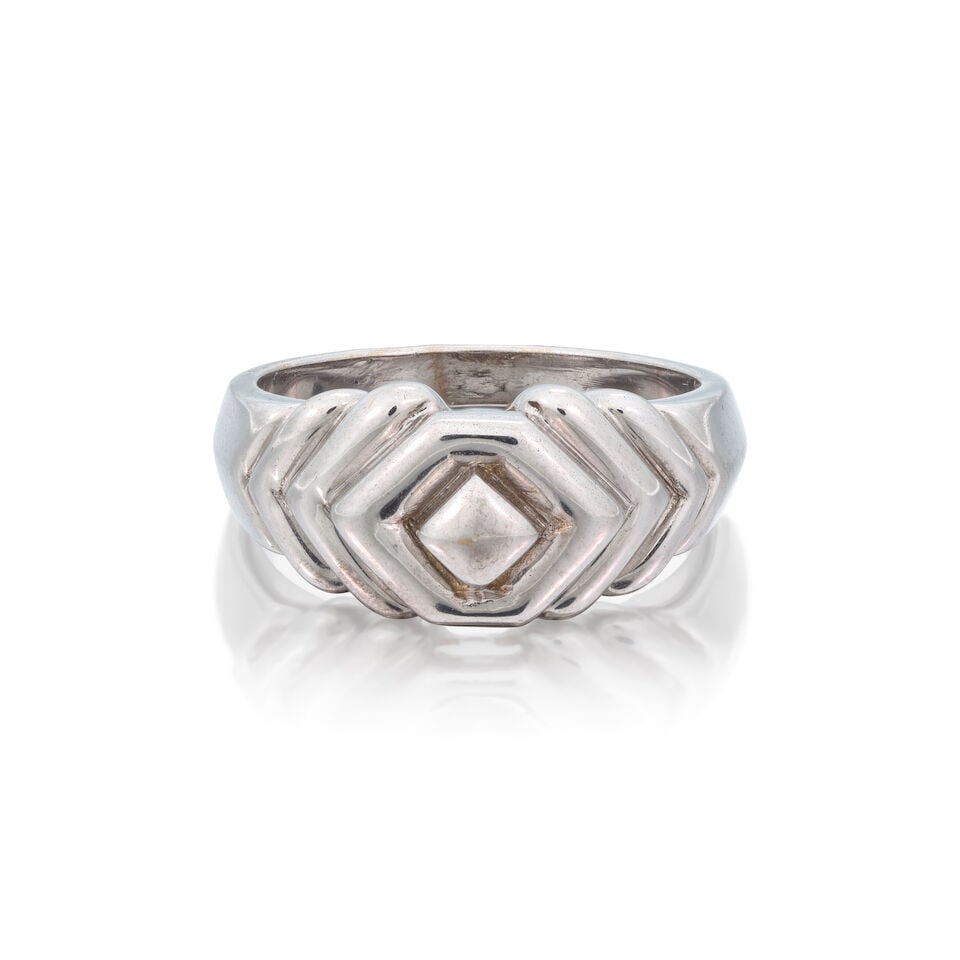 BOUCHERON: GEOMETRIC RING: BOUCHERON: GEOMETRIC RING Of concentric lozenge design Signed Boucheron, numbered A156 636, maker's mark, French assay mark Ring size approx. K½ Weight approx. 6.5g Footnotes: OVERALL CONDITION L