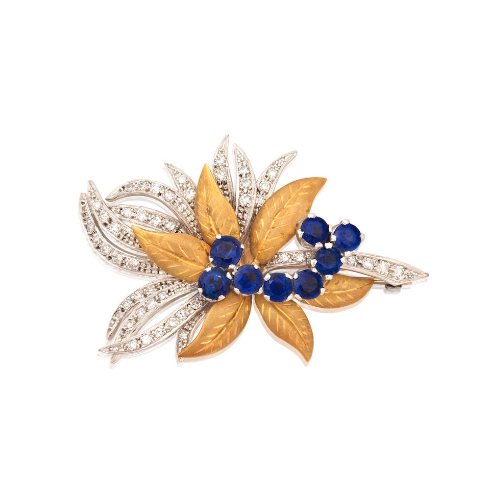 CROPP & FARR: SAPPHIRE AND DIAMOND FOLIATE BROOCH, 1990: CROPP & FARR: SAPPHIRE AND DIAMOND FOLIATE BROOCH, 1990 Circular-cut sapphires Single-cut diamonds approx. 0.45ct total 18 carat gold Maker's mark C&F, London hallmark Length 4.5cm Weight approx.