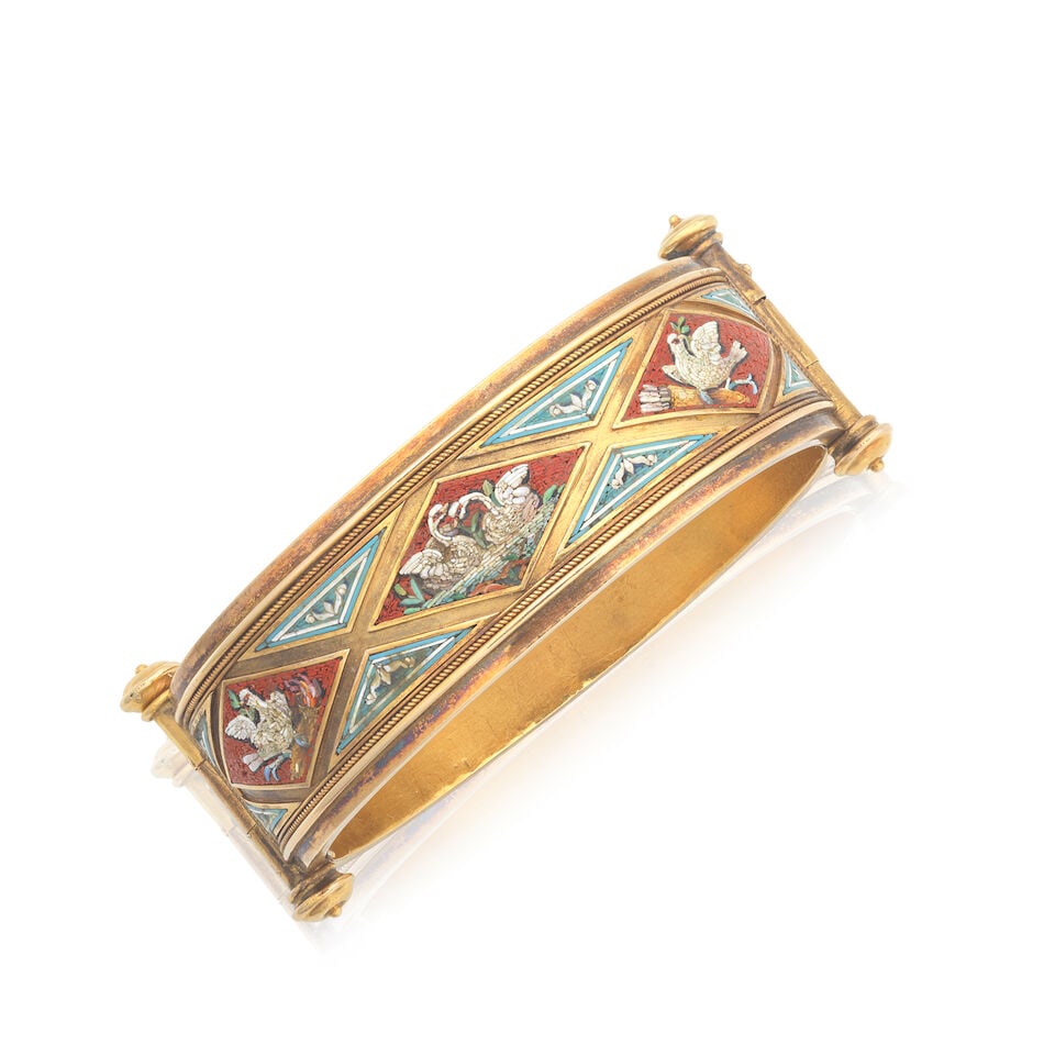 MICRO-MOSAIC BANGLE, CIRCA 1865: MICRO-MOSAIC BANGLE, CIRCA 1865 Depicting swans and doves Mounted in gold Inner circumference 16.0cm Weight approx. 40.0g Footnotes: OVERALL CONDITION Some wear, discolouration, light dents and some