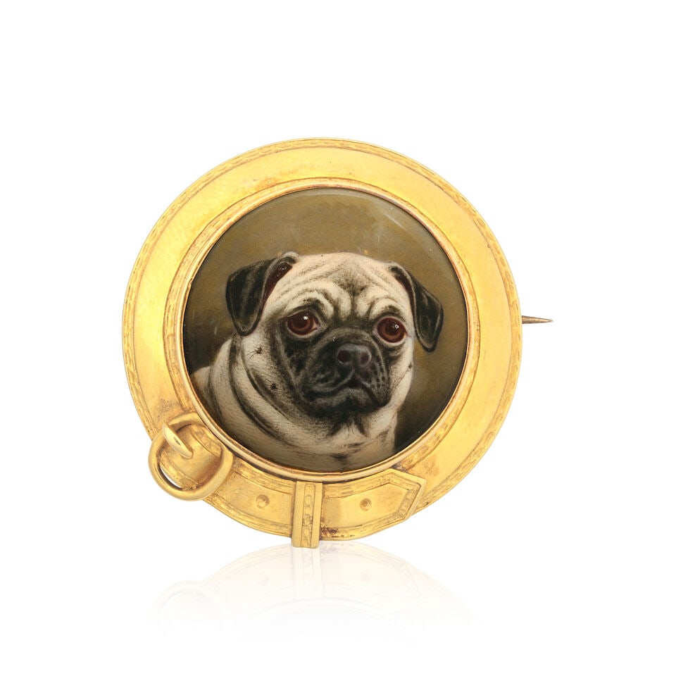 WILLIAM BISHOP FORD: ENAMEL PUG BROOCH, 1878: WILLIAM BISHOP FORD: ENAMEL PUG BROOCH, 1878 Enamel Mounted in gold Length 3.0cm Weight approx. 9.5g Footnotes: OVERALL CONDITION Some light wear to unhallmarked metal stamped to reverse with 18.
