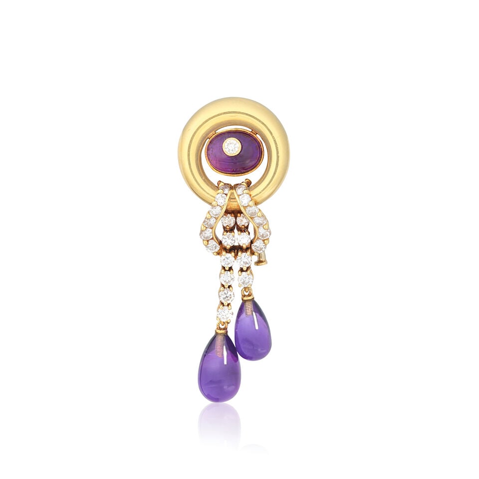 AMETHYST AND DIAMOND TASSEL BROOCH, CIRCA 1987: AMETHYST AND DIAMOND TASSEL BROOCH, CIRCA 1987 Amethyst cabochon and drops Brilliant-cut diamonds approx. 1.40cts total 18 carat gold UK import marks, French assay marks Length 5.0cm Weight approx.