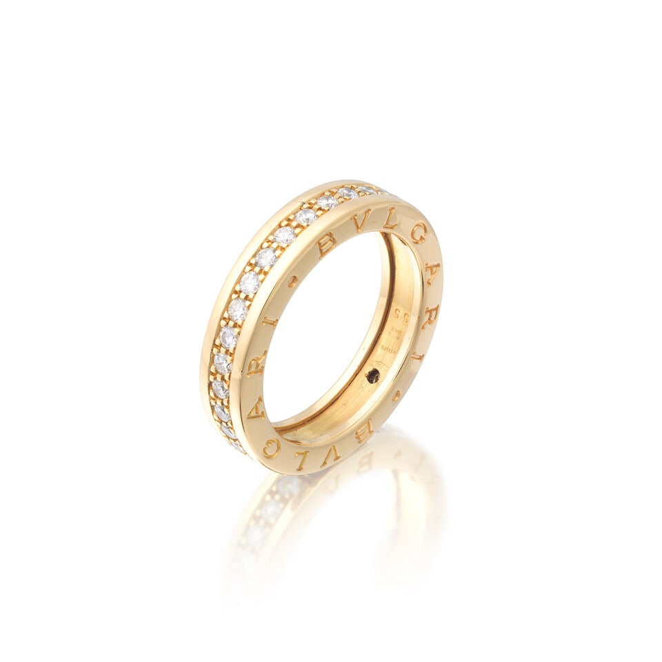 BULGARI: DIAMOND-SET ETERNITY RING: BULGARI: DIAMOND-SET ETERNITY RING Brilliant-cut diamonds approx. 0.60ct total Signed Bulgari Ring size approx. N½ Weight approx. 7.5g Footnotes: OVERALL CONDITION Light surface wear to