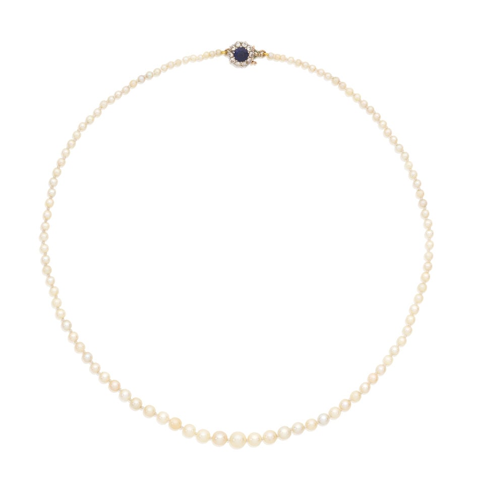CULTURED PEARL NECKLACE WITH SAPPHIRE AND DIAMOND CLASP: CULTURED PEARL NECKLACE WITH SAPPHIRE AND DIAMOND CLASP Cultured pearls Circular-cut sapphire Old brilliant-cut diamonds Length 44.0cm Weight approx. 8.5g Footnotes: OVERALL CONDITION Light surface