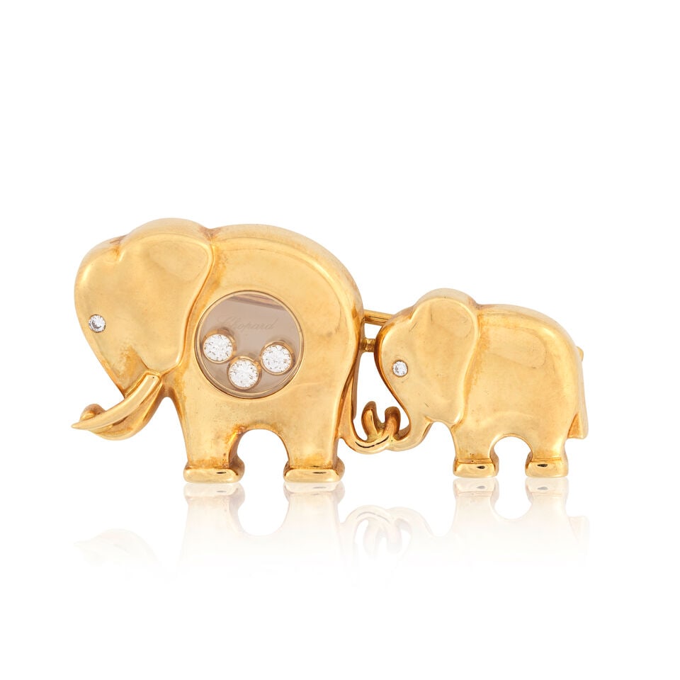 CHOPARD: DIAMOND-SET ELEPHANTS 'HAPPY DIAMONDS' BROOCH: CHOPARD: DIAMOND-SET ELEPHANTS 'HAPPY DIAMONDS' BROOCH Brilliant-cut diamonds Signed Chopard, numbered 2153, maker's mark LUC Length 3.5cm Weight approx. 15.5g Maker's case and box Footnotes: OVERALL