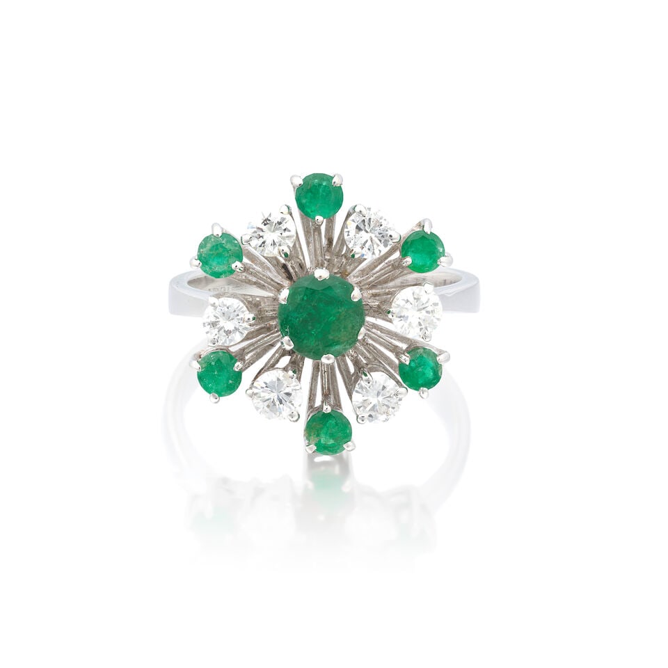 EMERALD AND DIAMOND RING: EMERALD AND DIAMOND RING Circular-cut emeralds Brilliant-cut diamonds approx. 0.50ct total Ring size approx. N½ Weight approx. 6.5g Footnotes: OVERALL CONDITION Light surface wear to