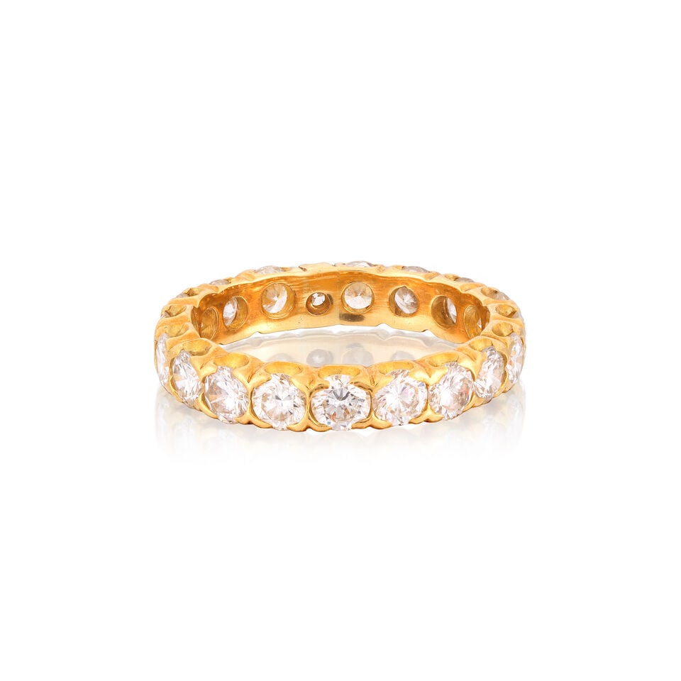 DIAMOND ETERNITY RING: DIAMOND ETERNITY RING Brilliant-cut diamonds approx. 1.15cts total Ring size approx. F½ Weight approx. 2.0g Footnotes: OVERALL CONDITION Light surface wear to unhallmarked yellow metal testing