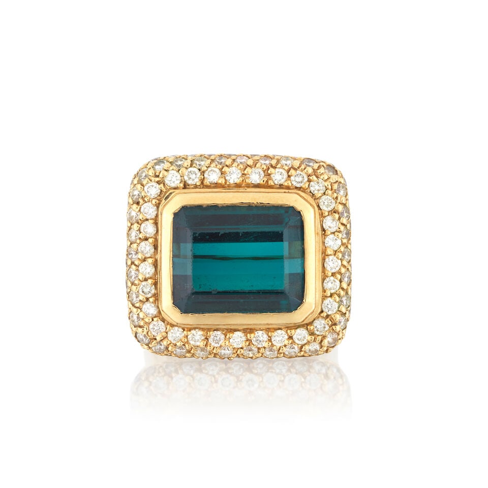 TOURMALINE AND DIAMOND CLUSTER RING: TOURMALINE AND DIAMOND CLUSTER RING Octagonal step-cut tourmaline Brilliant-cut diamonds approx. 2.10cts total Plaque length approx. 2.1cm Ring size approx. O (leading edge) Weight approx. 19.0g Footn