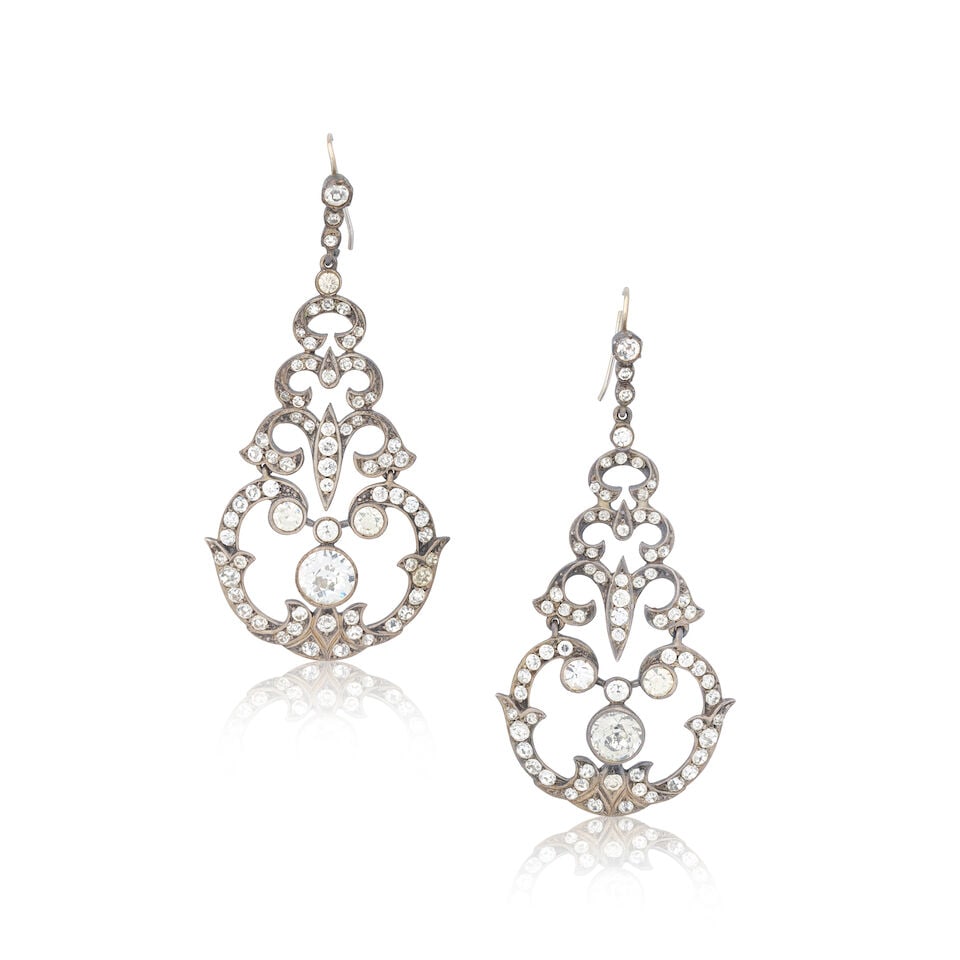 PASTE PENDENT EARRINGS, LATE 19TH CENTURY: PASTE PENDENT EARRINGS, LATE 19TH CENTURY Circular-cut paste Within foiled closed back settings Length 6.0cm Weight approx. 19.5g Footnotes: OVERALL CONDITION Some wear to unhallmarked metal testing