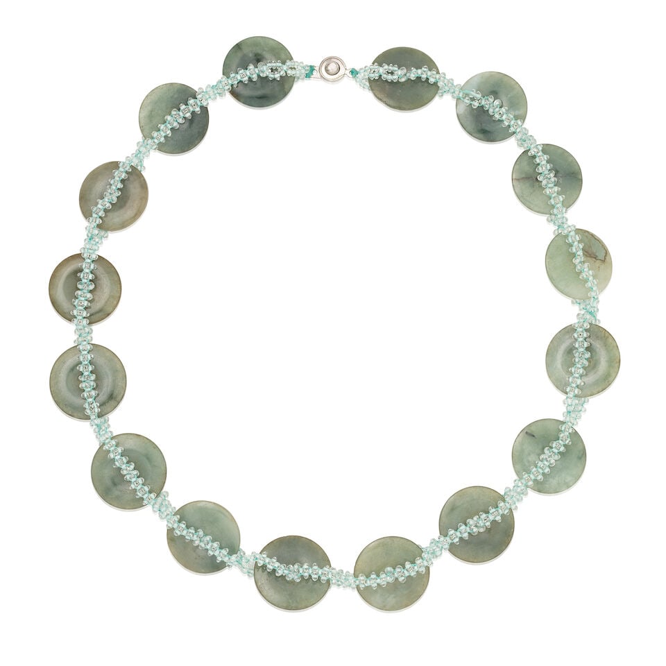 JADE AND ROCK CRYSTAL NECKLACE: JADE AND ROCK CRYSTAL NECKLACE Carved jadeite jade Faceted rock crystal beads Length 54.5cm Weight approx. 77.5g Footnotes: OVERALL CONDITION Very light surface wear to unhallmarked clasp testing as b