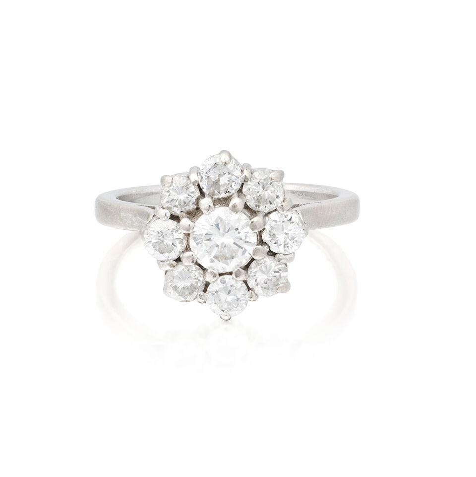 DIAMOND CLUSTER RING: DIAMOND CLUSTER RING Brilliant-cut diamonds approx. 1.10cts total Ring size approx. L Weight approx. 5.0g Footnotes: OVERALL CONDITION Some surface wear, light dents and scratches, to unhallmarked