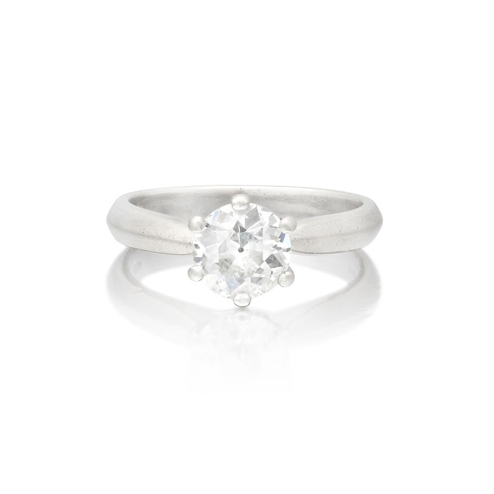 DIAMOND SINGLE-STONE RING, 2003: DIAMOND SINGLE-STONE RING, 2003 Old brilliant-cut diamond weighing 1.07 carats 18 carat gold London hallmark Ring size approx. L½ Weight approx. 4.0g Footnotes: OVERALL CONDITION Visible surface