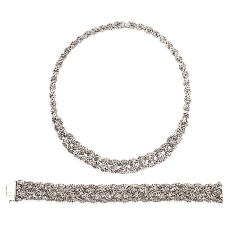 BUCHERER: BRACELET AND NECKLACE SUITE: BUCHERER: BRACELET AND NECKLACE SUITE Of braided woven design Maker's mark CB Bracelet length 19.6cm, necklace length approx. 42.2cm Weight approx. 119.0g Maker's case Footnotes: OVERALL