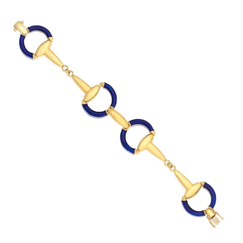 UNOAERRE: ENAMEL HORSEBIT BRACELET: UNOAERRE: ENAMEL HORSEBIT BRACELET Signed Unoaerre Blue enamel Length 19.5cm Weight approx. 38.0g Footnotes: OVERALL CONDITION Some surface wear to unhallmarked yellow metal stamped 750, Italian assay