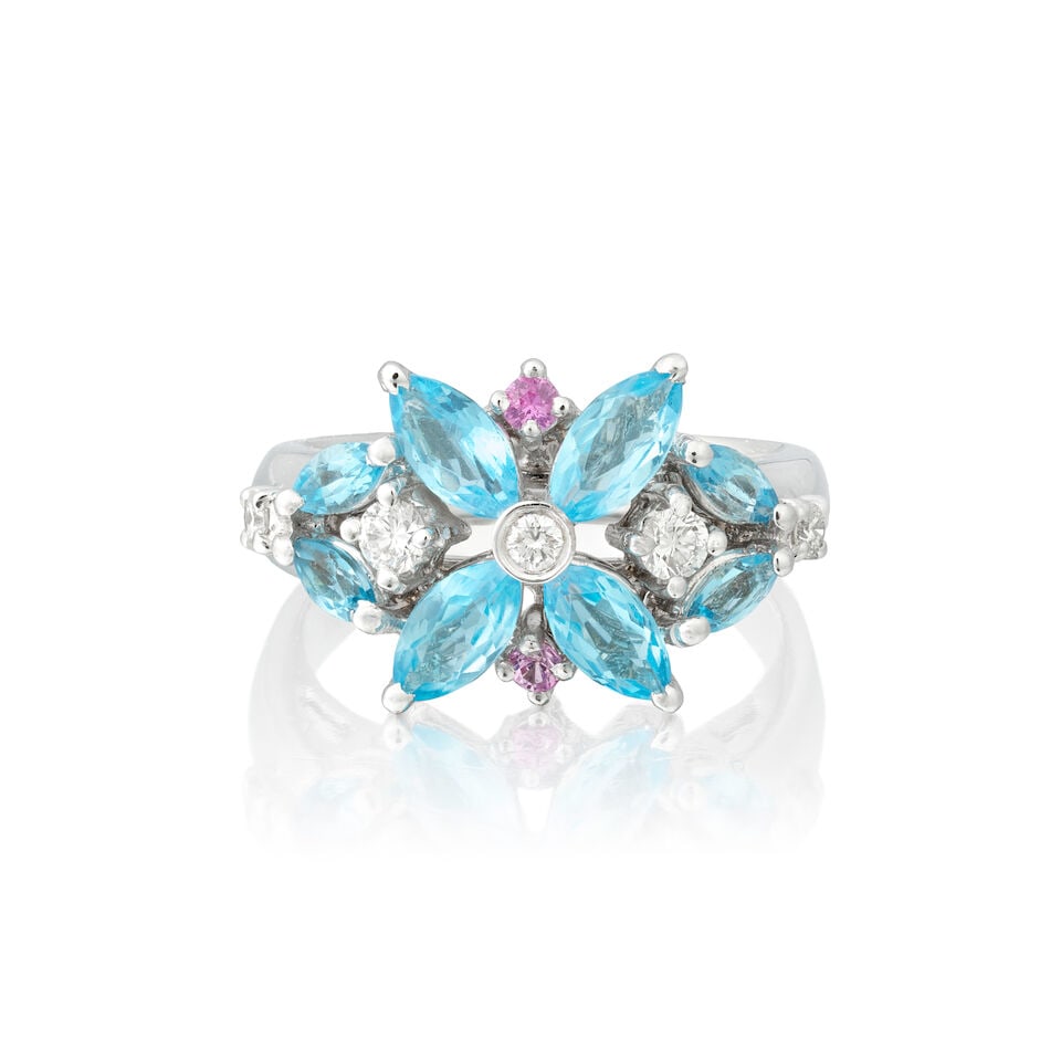 TRIO: TOPAZ, PINK SAPPHIRE AND DIAMOND RING: TRIO: TOPAZ, PINK SAPPHIRE AND DIAMOND RING Marquise-cut blue topaz Circular-cut pink sapphires Brilliant-cut diamonds Signed Trio Ring size approx. K Weight approx. 5.5g Footnotes: OVERALL CONDITION 