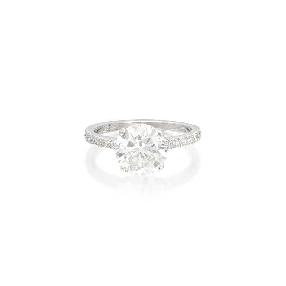 DIAMOND SINGLE-STONE RING, 2010: DIAMOND SINGLE-STONE RING, 2010 Brilliant-cut diamond weighing 2.15 carats Single-cut diamonds Platinum London hallmark Ring size approx. J Weight approx. 3.5g Footnotes: OVERALL CONDITION Light wear