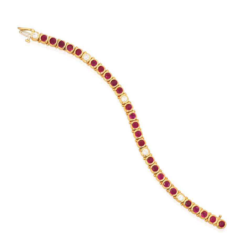 RUBY AND DIAMOND BRACELET, CIRCA 1994: RUBY AND DIAMOND BRACELET, CIRCA 1994 Circular-cut rubies Brilliant-cut diamonds approx. 1.25cts total 18 carat gold UK import mark Length 17.5cm Weight approx. 35.0g Footnotes: Please note, this lot 