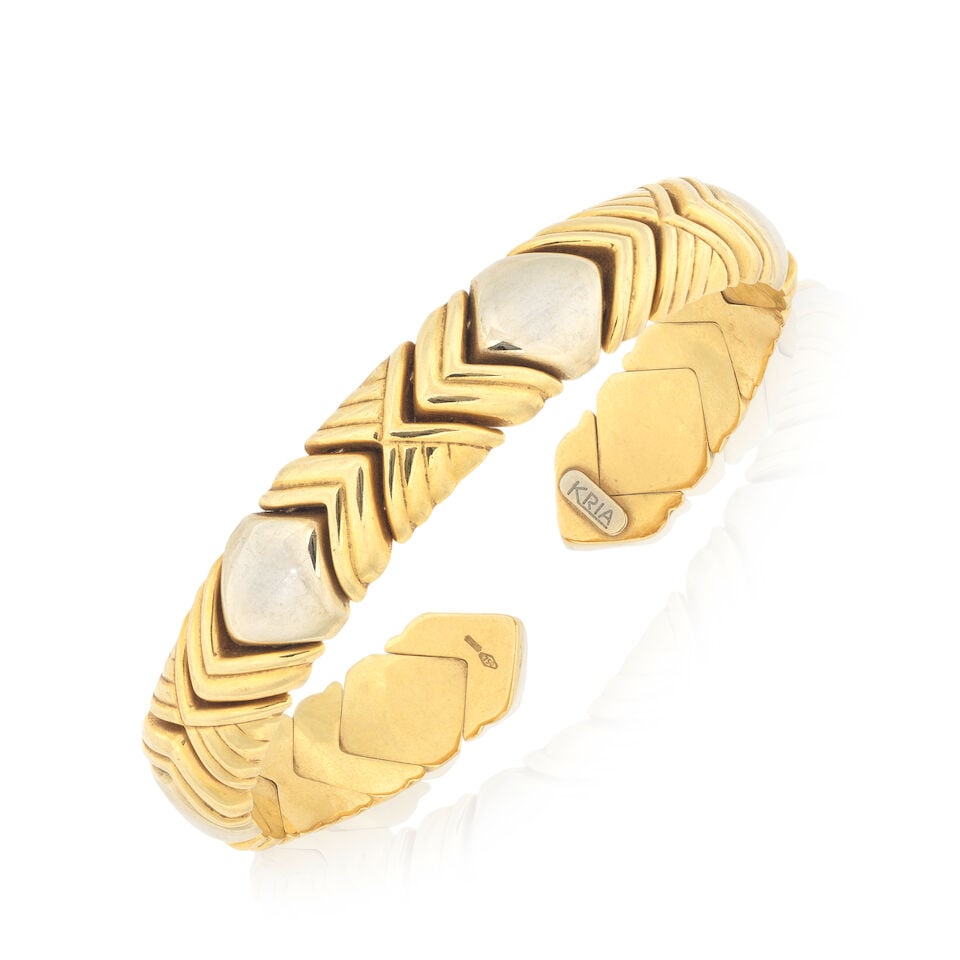 KLIA: BANGLE: KLIA: BANGLE Of geometric, sprung design Inner circumference approx. 17.0cm Weight approx. 31.0g Footnotes: Property from a Private Collection OVERALL CONDITION Some surface wear to unhallmarked