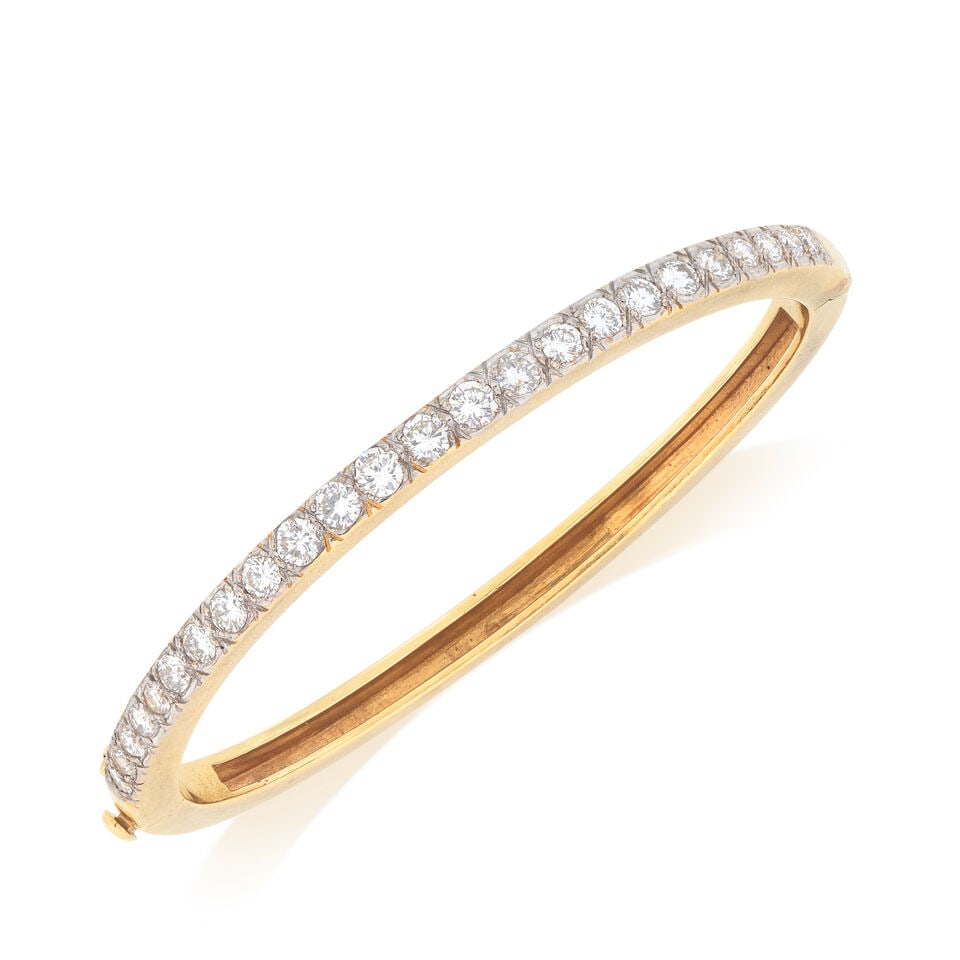 DIAMOND-SET BANGLE: DIAMOND-SET BANGLE Brilliant-cut diamonds approx. 2.80cts total Inner circumference approx. 16.0cm, width 0.35cm Weight approx. 22.5g Footnotes: Property from a Private Collection OVERALL
