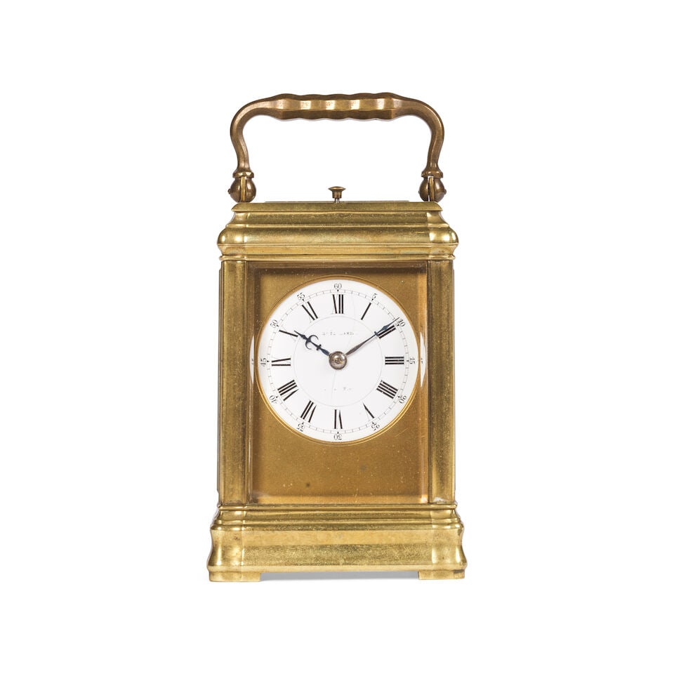 Petite pendule de voyage à boîtier à gorge de la fin du XIXe siècle A small ... (1 of 5)