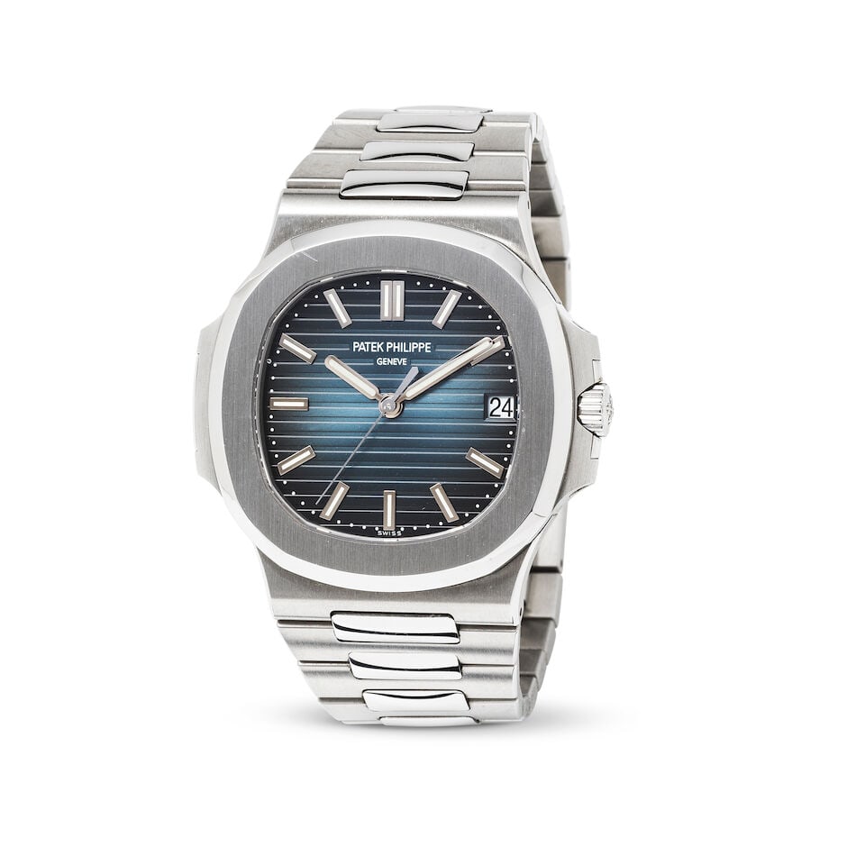 Patek Philippe. A fine stainless steel automatic calendar bracelet watch Patek Philippe. Belle m... (1 of 3)