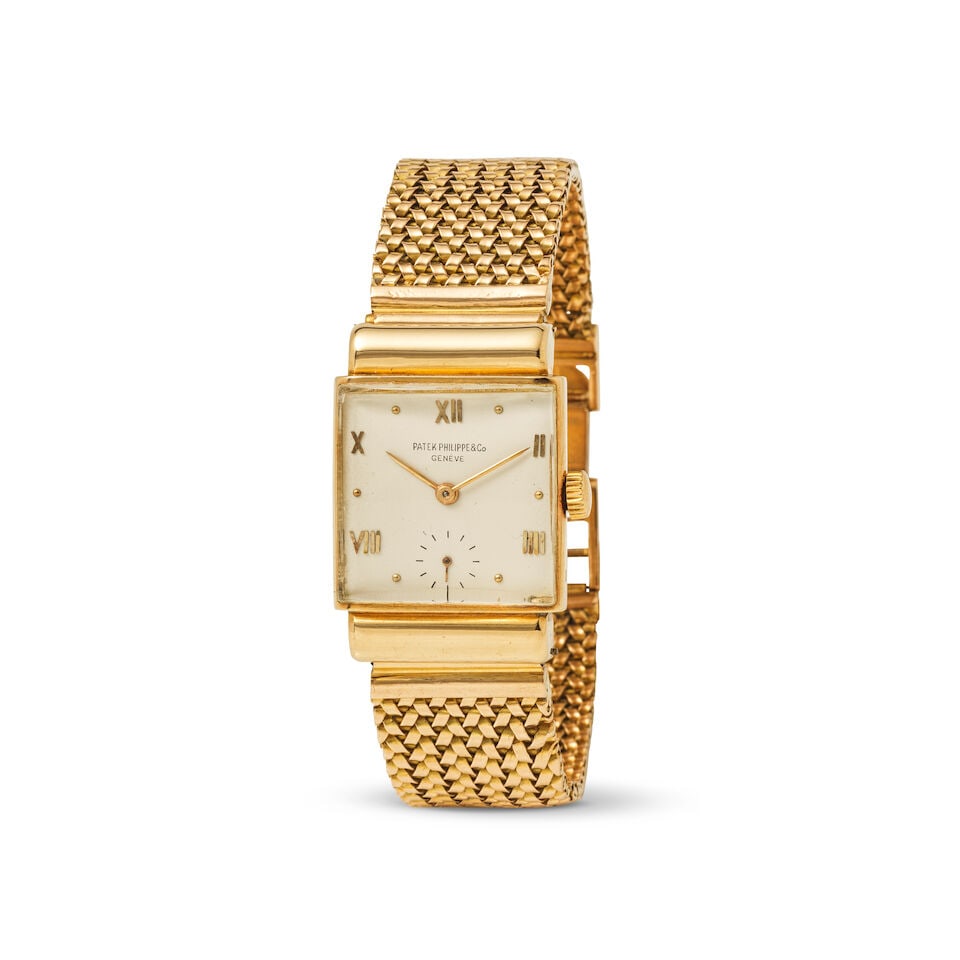 Patek Philippe. A fine 18K gold manual wind rectangular bracelet watch Patek Philippe. Montre br... (1 of 1)