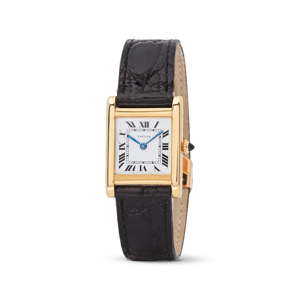 Cartier. An 18K gold manual wind rectangular wristwatch Cartier. Montre bracelet en or jaune 18K... (1 of 1)