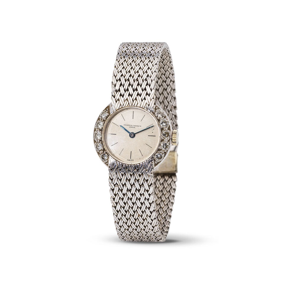 Vacheron & Constantin. A lady's 18K white gold manual wind bracelet watch with diamond set bezel... (1 of 1)