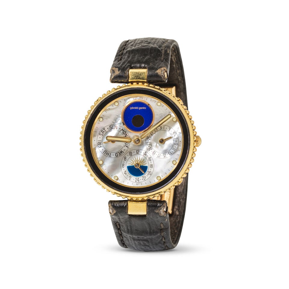 Gerald Genta. An 18K gold quartz calendar wristwatch with moon phase and 2nd time zone indicatio... (1 of 1)