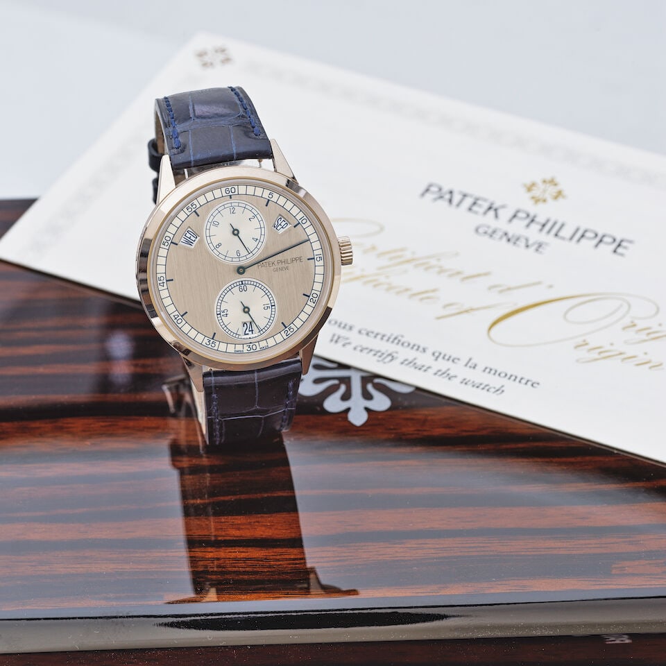 Patek Philippe. A very fine and rare 18K white gold automatic annual calendar wristwatch Patek P... - 3