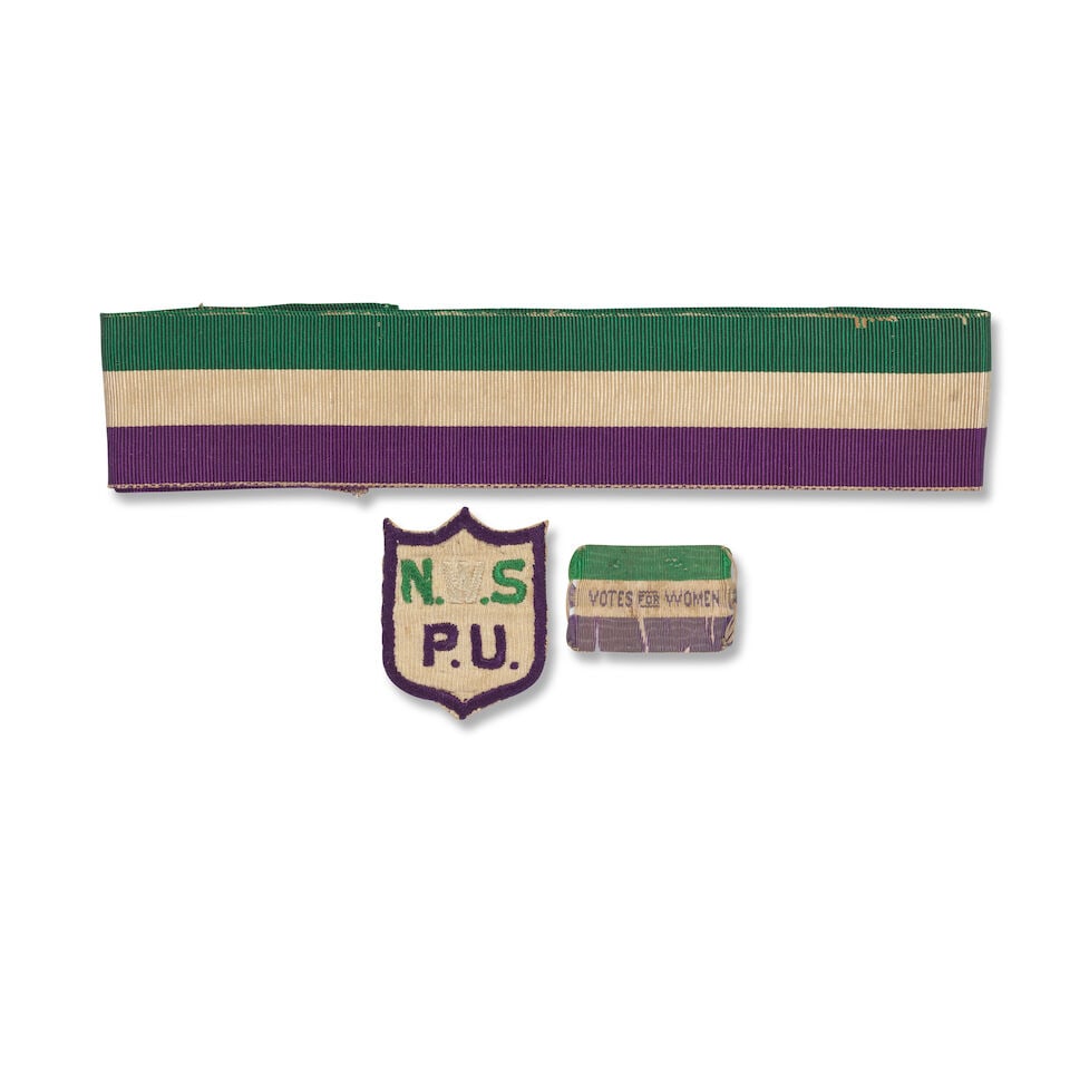TEXTILES AND EPHEMERA hatband, badges, pencils, ribbon: TEXTILES AND EPHEMERA Group of textiles and other WSPU ephemera including a hatband in the WSPU colours of purple, white and green, grosgrain ribbon, discoloured, remnants of stitching where attached,