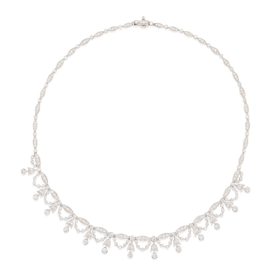 18K GOLD AND DIAMOND FRINGE NECKLACE: 18K GOLD AND DIAMOND FRINGE NECKLACE • 18k white gold • Numerous round diamonds weighing approximately 6.90 - 7.10 carats total • Length 14 1/2 in. • Estimated gross weight: