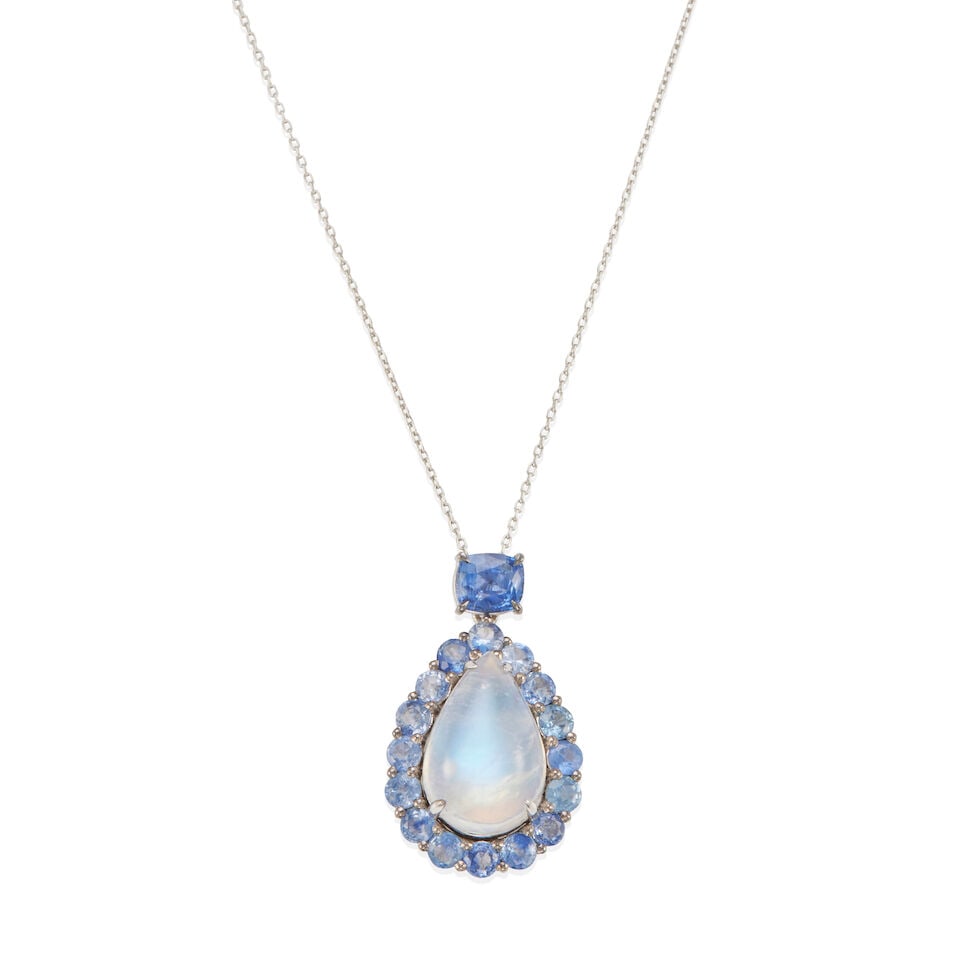 PLATINUM, MOONSTONE AND SAPPHIRE PENDANT AND CHAIN NECKLACE: PLATINUM, MOONSTONE AND SAPPHIRE PENDANT AND CHAIN NECKLACE • Platinum • 1 pear-shaped cabochon moonstone weighing approximately 5.20 - 5.30 carats • Numerous round and 1
