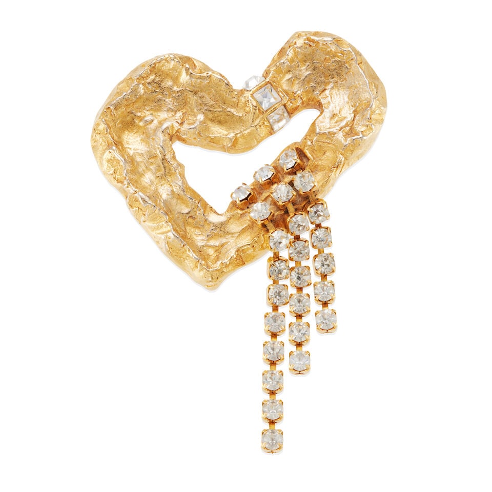 CHRISTIAN LACROIX: RHINESTONE HEART BROOCH: CHRISTIAN LACROIX: RHINESTONE HEART BROOCH • Gold-plated base metal • Numerous round and square rhinestones • Signed Christian LaCroix, Made in France • Measures 3 3/8 x 2 3/8