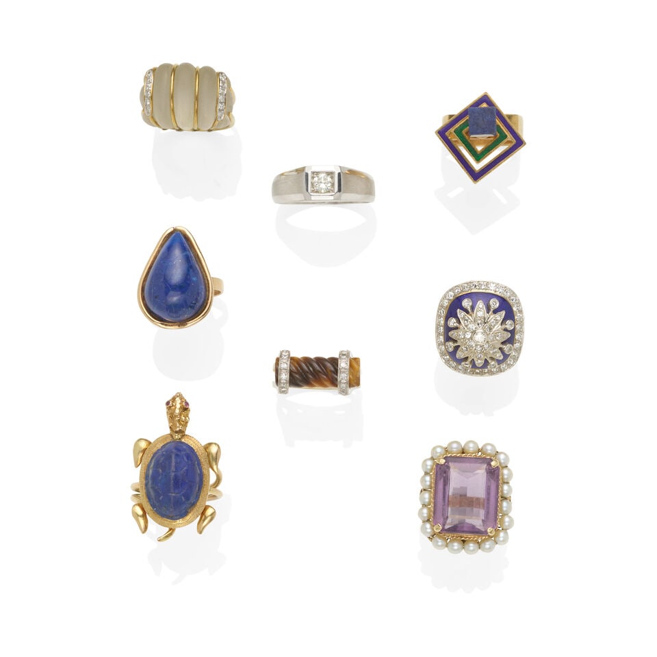 EIGHT GOLD, ENAMEL AND GEM-SET RINGS: EIGHT GOLD, ENAMEL AND GEM-SET RINGS • One ring of 18k white gold with 1 round-cut diamond weighing approximately 0.25 carat, stamped with maker's mark, size 10 ¼ • One spinning ring