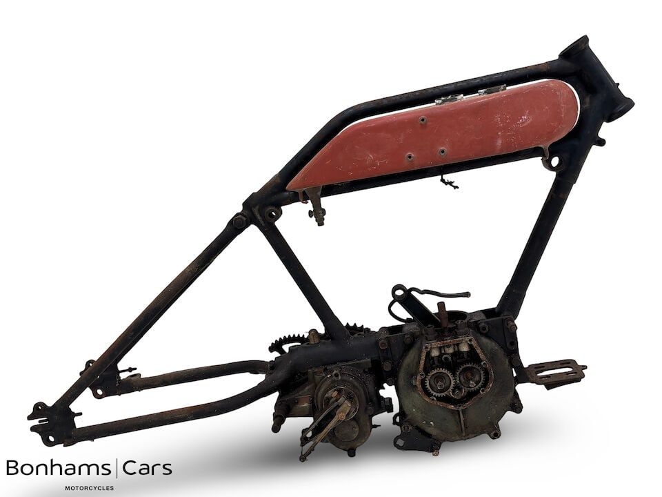 An AJS project ((Qty)): An AJS project comprising of a frame (numbered H91080); engine (numbered G87807); gearbox (numbered H9/97842) and forks, condition and completeness unknown, close inspection advised.