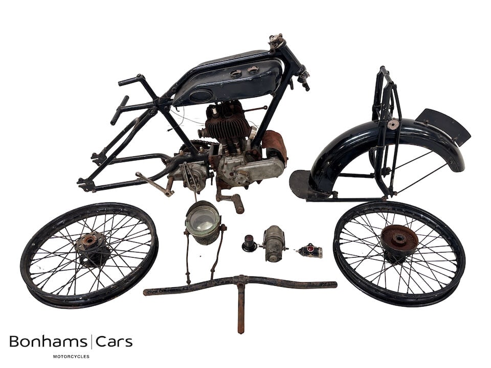 An AJS project ((Qty)): An AJS project comprising of a frame (numbered K99272); engine (numbered K9/99272); gearbox (numbered K9/99272); wheels; forks; headlight and acetylene generator, condition and completeness unknown, c
