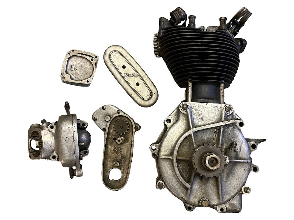 A c.1937 Norton engine: A c.1937 Norton engine numbered 71483 (79x100), with detached cambox and timing covers. Condition and completeness unknown. Prospective bidders must satisfy themselves as to the condition,