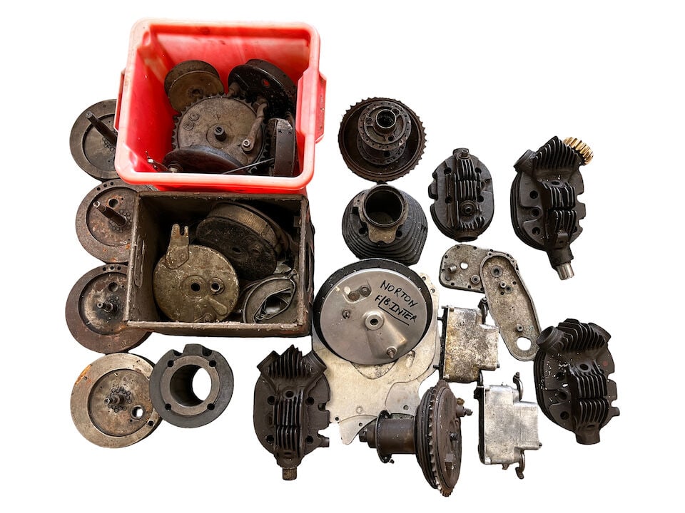 A quantity of believed mostly Sunbeam and Norton components: A quantity of believed mostly Sunbeam and Norton components including cylinder heads; barrels; flywheels; hubs; brakeplates; and sundry parts. Condition and completeness unknown. Prospective bidders