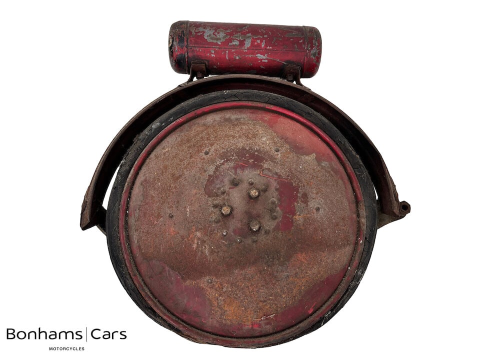 A Briggs and Stratton Motor Wheel: A Briggs and Stratton Motor Wheel numbered D8285, for restoration and sold strictly as viewed, cloze inspection advised. Footnotes: BUYER'S PREMIUM The Buyer's Premium for this Lot is 28%+VAT on the