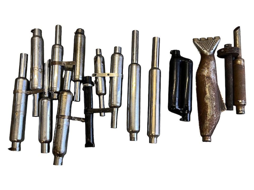 A large quantity of exhaust pipes and silencers (1 of 2)