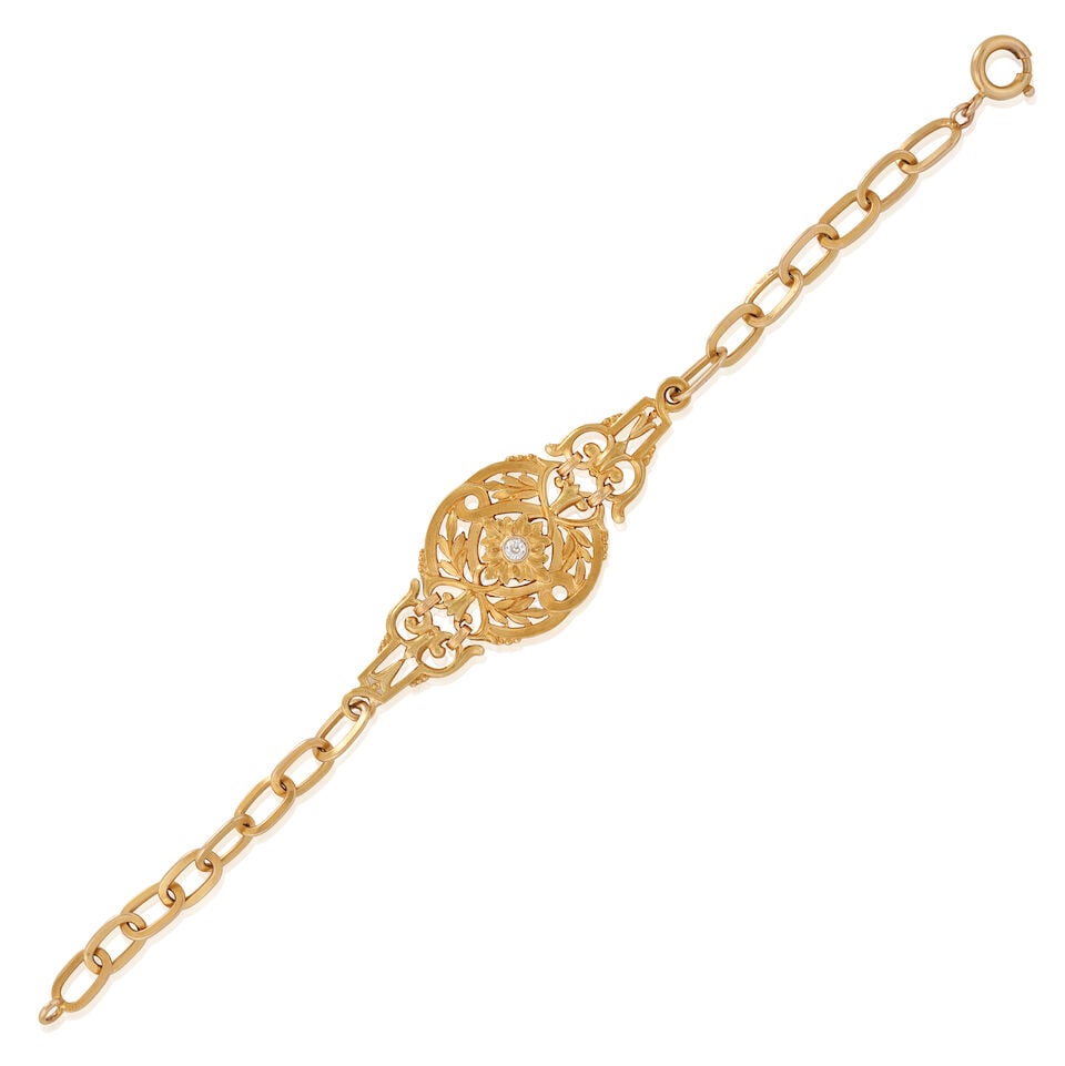 A GOLD AND DIAMOND BRACELET (1 of 4)