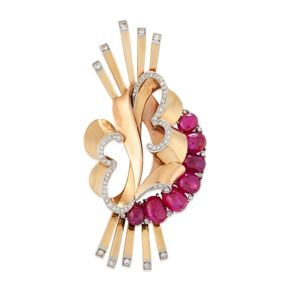 TRABERT & HOEFFER MAUBOUSSIN: A RETRO 14K GOLD, RUBY, AND DIAMOND 'REFLECTION' BROOCH: TRABERT & HOEFFER MAUBOUSSIN: A RETRO 14K GOLD, RUBY, AND DIAMOND 'REFLECTION' BROOCH From the 'Reflection' collection, set with graduating oval cabochon rubies, and single and old transitional-cut