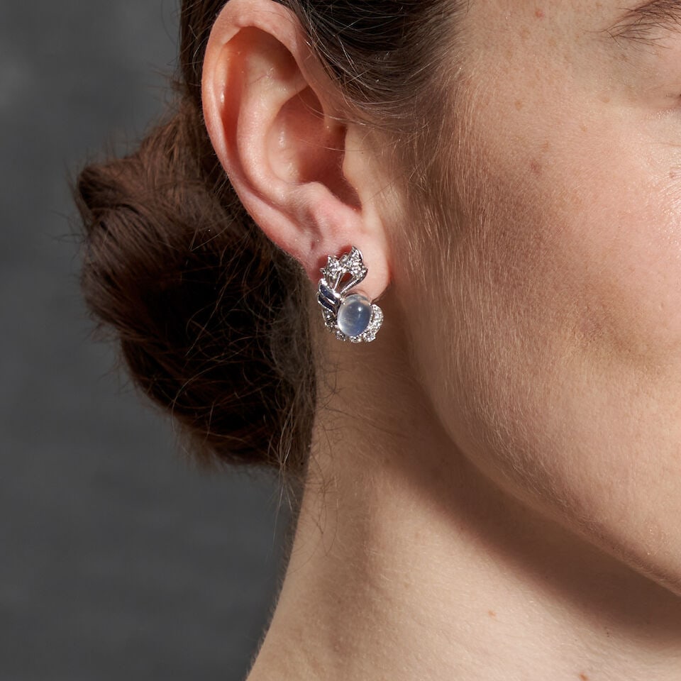 A PAIR OF PLATINUM, MOONSTONE, SAPPHIRE, AND DIAMOND EARCLIPS, CIRCA 1950 - 2