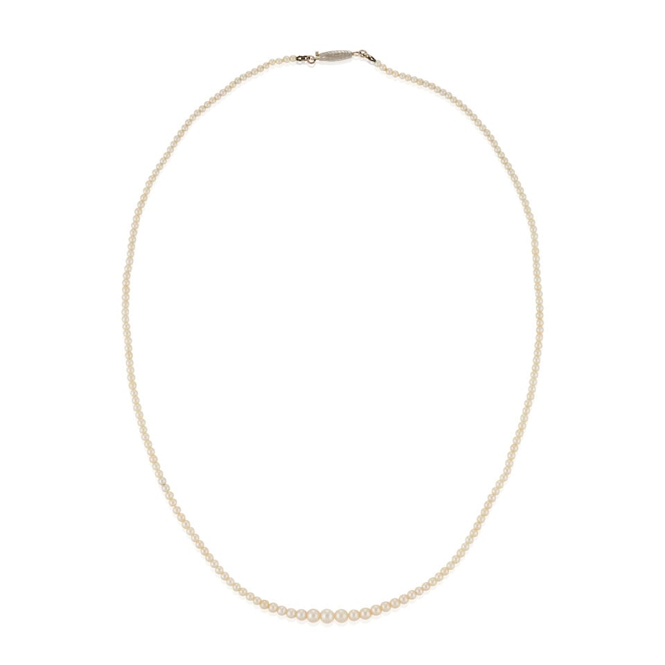 AN ART DECO PEARL NECKLACE: AN ART DECO PEARL NECKLACE The pearls graduating in size from approximately 1.90 to 4.05 mm, in a fitted Tiffany & Co. box, length 16 3/4 in. Footnotes: Please note that the pearls have not been