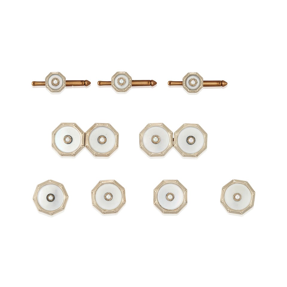 LARTER & SONS: AN ART DECO BI-COLOR GOLD, MOTHER-OF-PEARL, AND SEED PEARL DRESS SET: LARTER & SONS: AN ART DECO BI-COLOR GOLD, MOTHER-OF-PEARL, AND SEED PEARL DRESS SET Comprising a pair of cufflinks, four vest buttons, and three shirt studs, each with mother-of-pearl and seed pearl