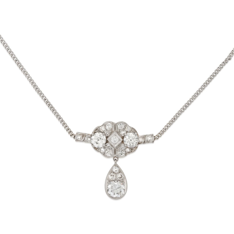 A PLATINUM AND DIAMOND PENDANT: A PLATINUM AND DIAMOND PENDANT The pendant set with old European and single-cut diamonds, suspending a drop set with old European and transitional-cut diamonds, approximate total weight 2.80 carats,